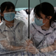 Two schoolgirls participate in a boycott of their classes in protest against the government in Hong Kong on September 2, 2019